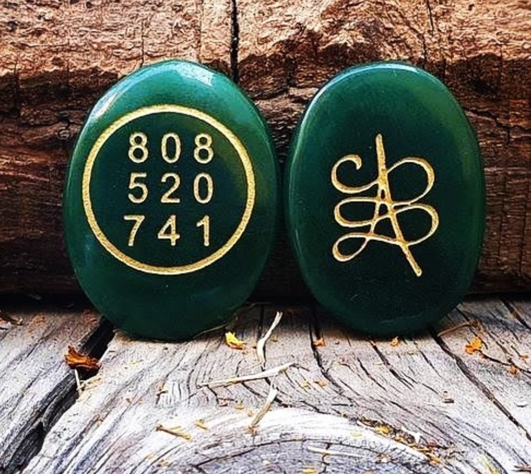 GREEN AVENTURINE ENERGISED AND ENGRAVED MONEY CODE AND ZIBU SYMBOL